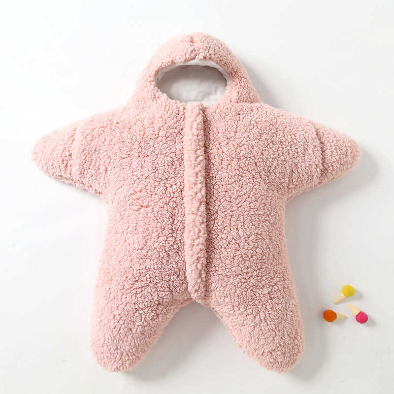 Baby sovepose i sjøstjerne form