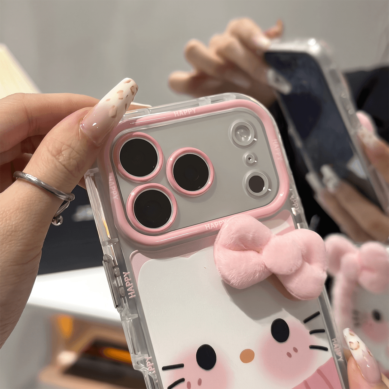 MiraLume iPhone-deksel med Pom-Pom og Speilstativ
